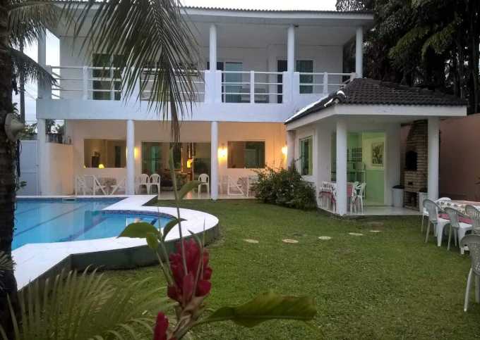 CASA 4 SUITES AR CONDICIONADO CONDOMINIO JARDIM ACAPULCO GUARUJÁ