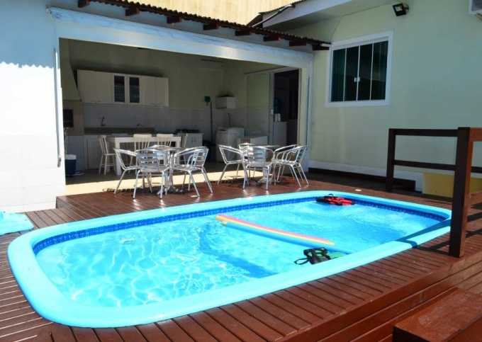 Casa com piscina para 10 pessoas, 3 dormitórios com ar condicionado - Cód 9002