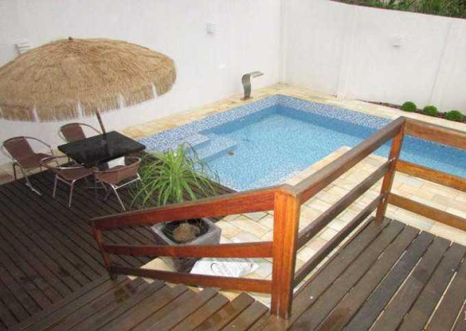 Linda casa com piscina e 4 suítes com ar condicionado em Balneário Camboriú.