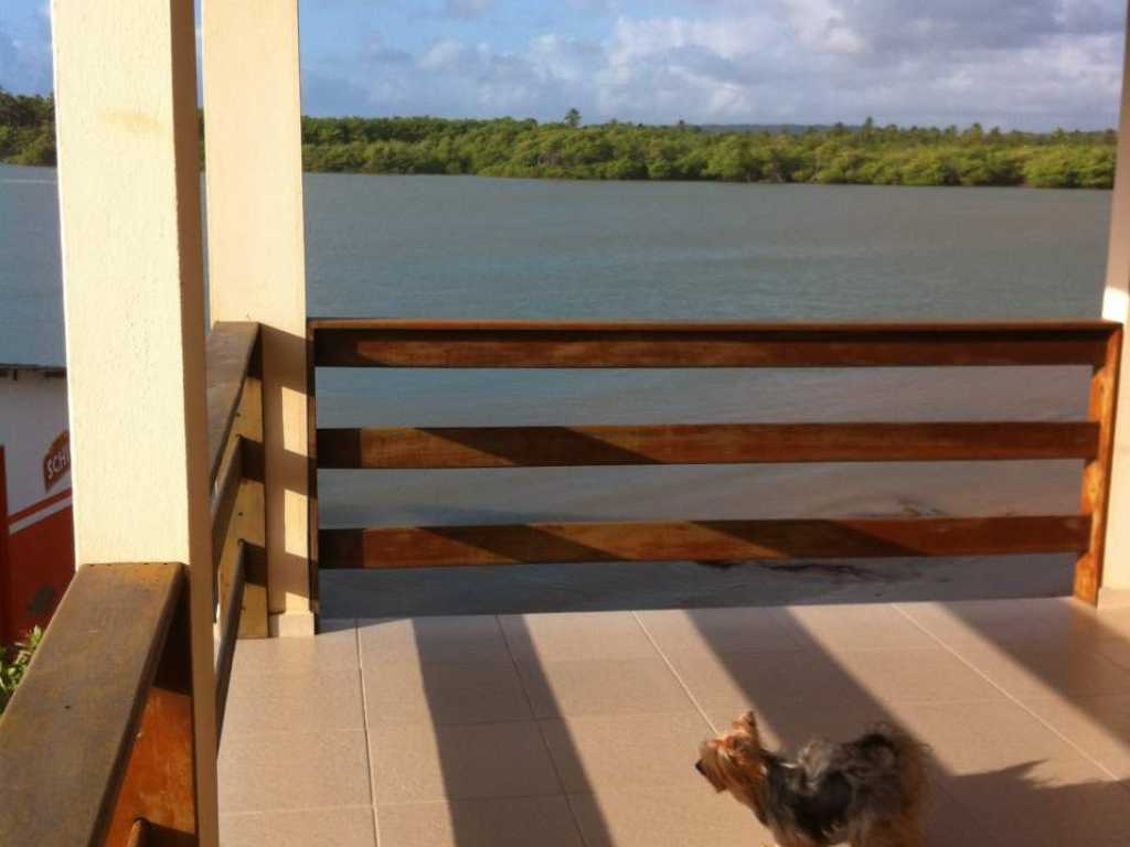 Casa em Frente ao Rio e ao Mar