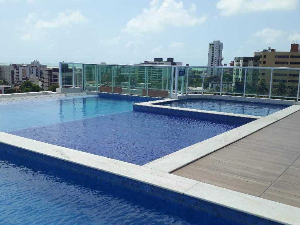 Excelente apartamento com vista para o mar, com piscinas e áreas de lazer para você relaxar