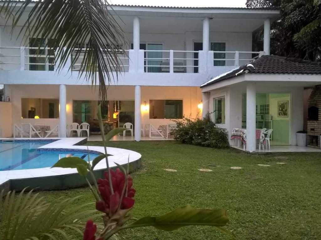 CASA 4 SUITES AR CONDICIONADO CONDOMINIO JARDIM ACAPULCO GUARUJÁ