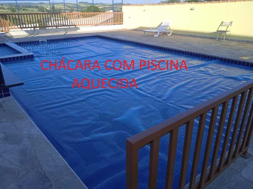 COM PISCINA AQUECIDA. ESTR. ASFALTADA. 3 QUARTOS, 4 BANHEIROS, 2 PISCINAS, BAR MOLHADO,  CAMPO, CHURRASQUEIRA, FORNO. COMPLETA PARA  LAZER.