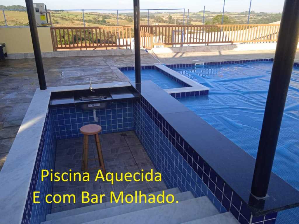 COM PISCINA AQUECIDA. ESTR. ASFALTADA. 3 QUARTOS, 4 BANHEIROS, 2 PISCINAS, BAR MOLHADO,  CAMPO, CHURRASQUEIRA, FORNO. COMPLETA PARA  LAZER.