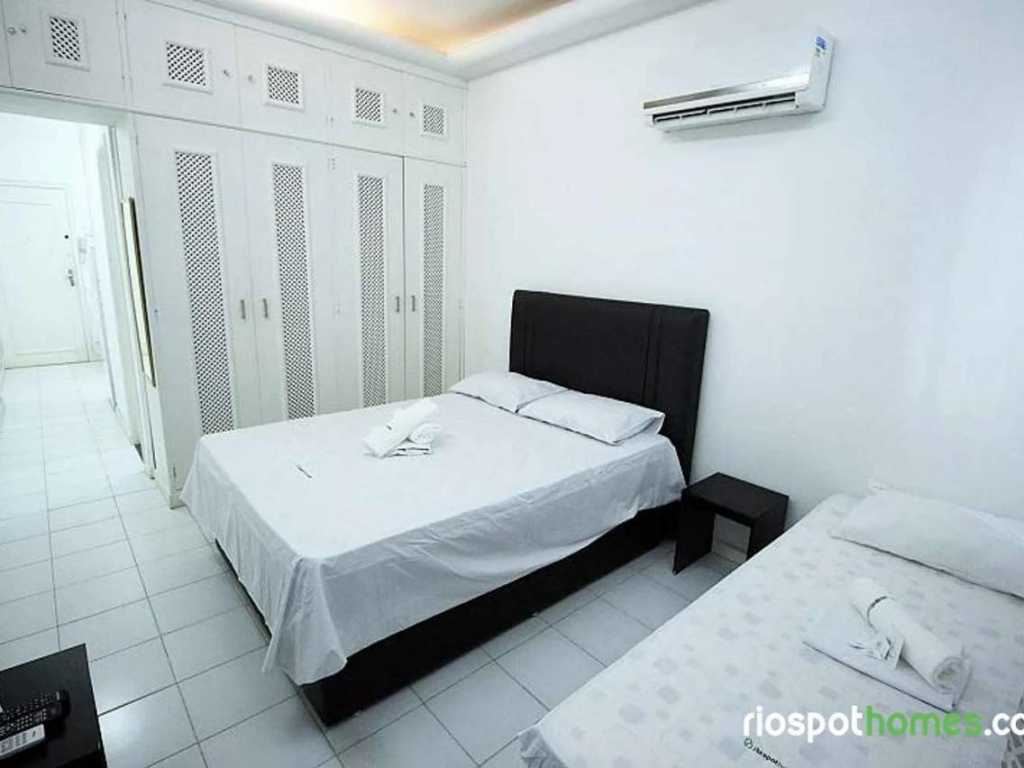Apartamento aconchegante com ar condicionado e amenidades gratuitas.