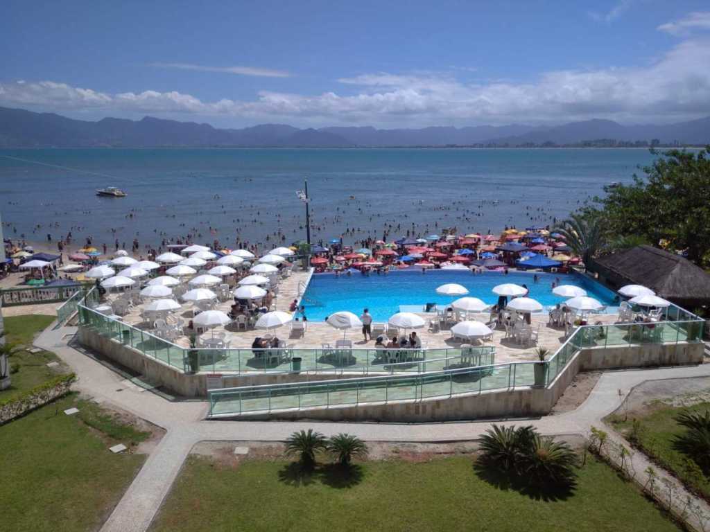 Alugo Apartamento Pé na  Areia ,frente pro Mar e piscina na Prainha 🏖em Caraguatatuba