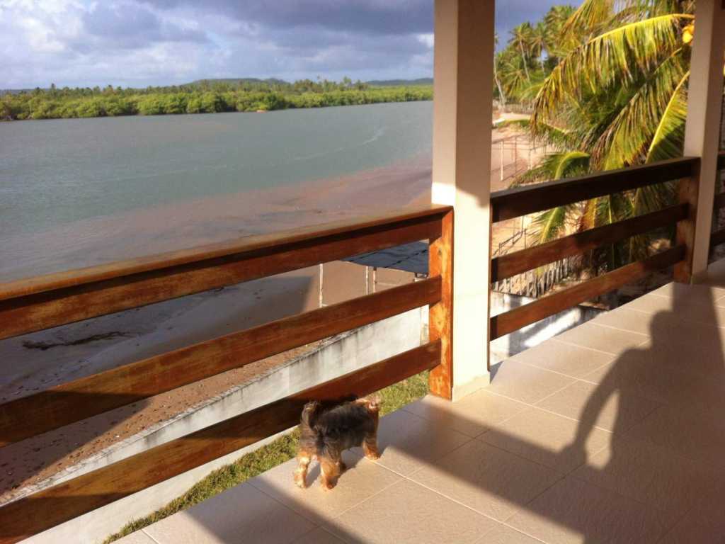 Casa em Frente ao Rio e ao Mar