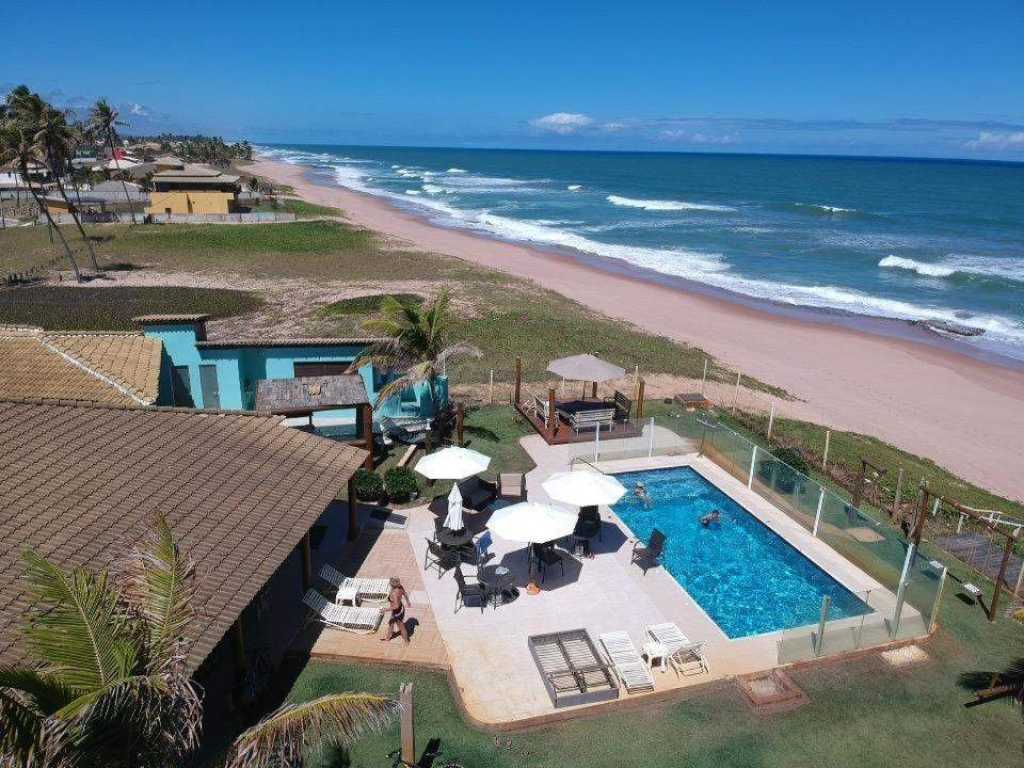 casa frente ao mar pé na areia 9 suítes