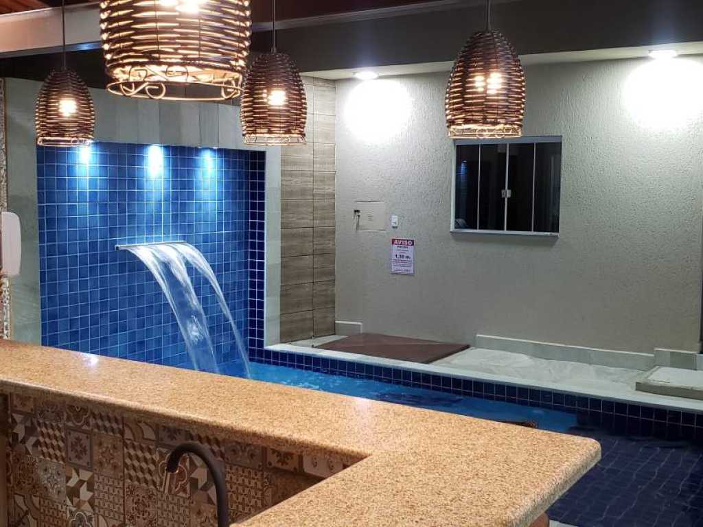 Linda casa com 5 suítes e piscina aquecida