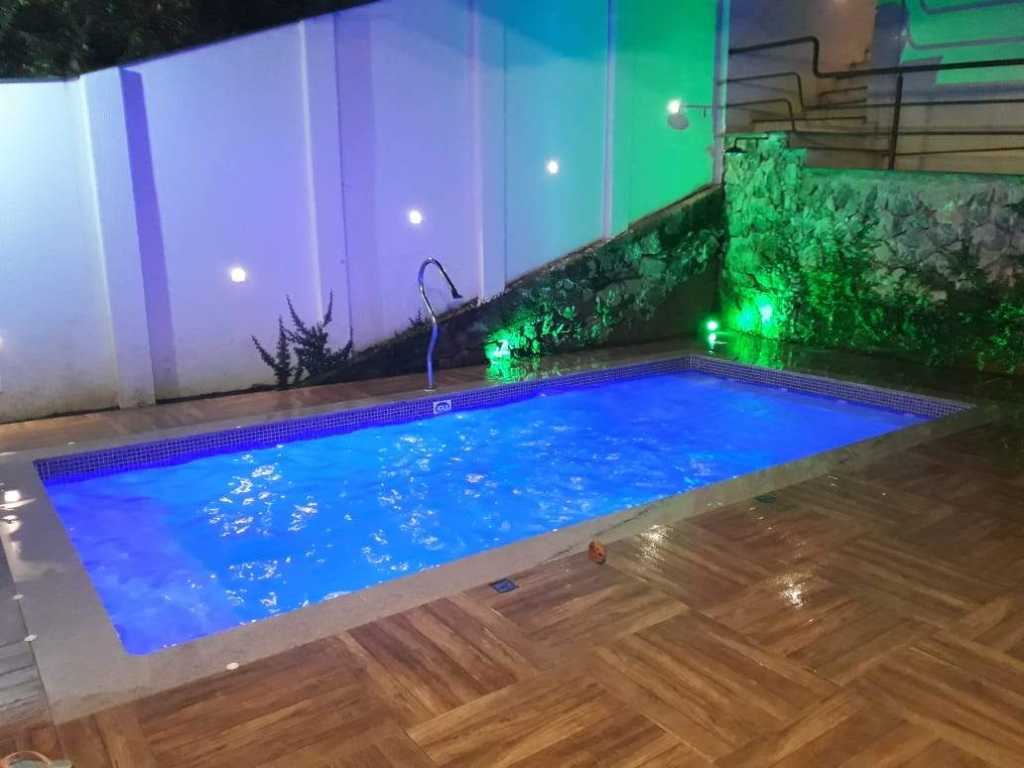 Casa de luxo com piscina na Praia das Castanheiras - Guarapari-ES