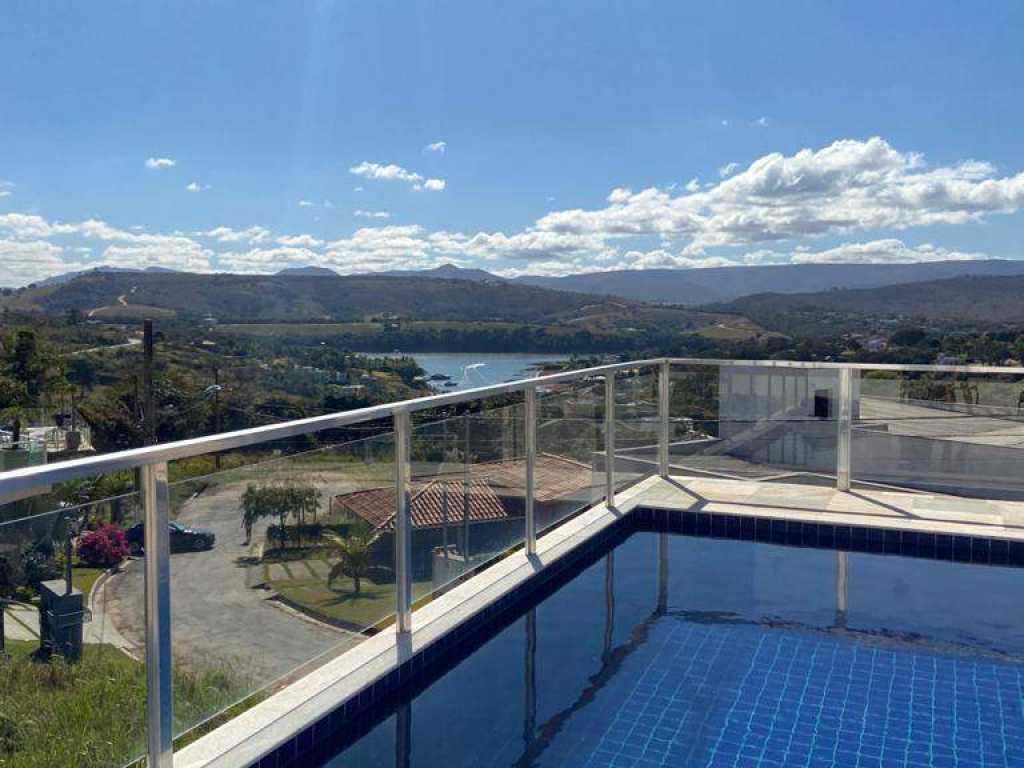 Maravilhosa Casa no Condomínio Escarpas do Lago com 4 suítes e área de lazer com piscina e churrasqueira