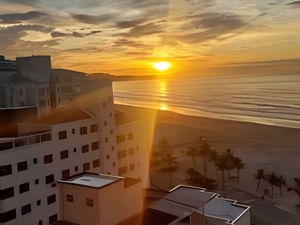 Em frente ao quiosque Ocian na praia, pé na areia