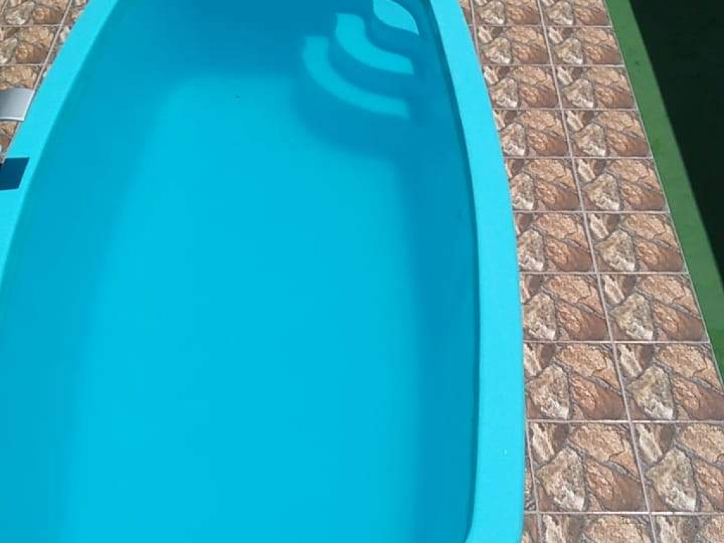 Ótima casa com piscina em Praia Grande