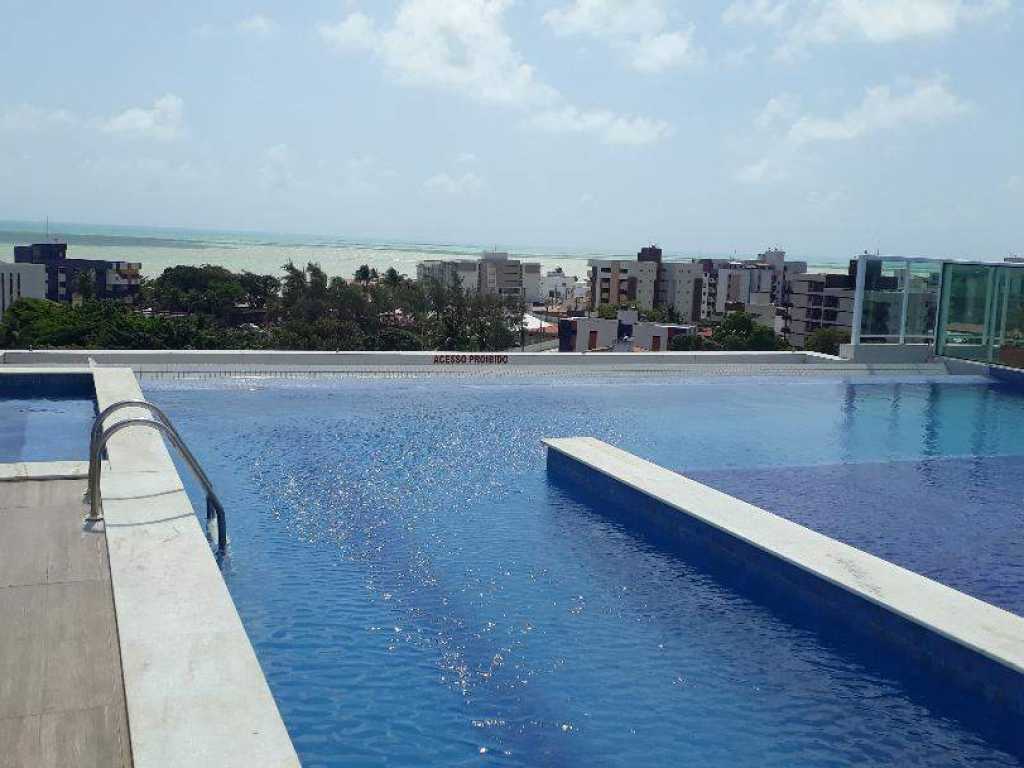 Excelente apartamento com vista para o mar, com piscinas e áreas de lazer para você relaxar