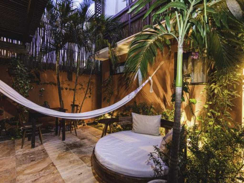 Suite com Vista Jardim Tropical
