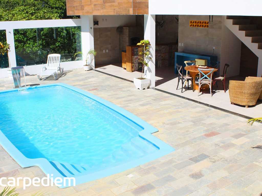 Casa com piscina privativa e poucos passos do mar em Cotovelo por Carpediem