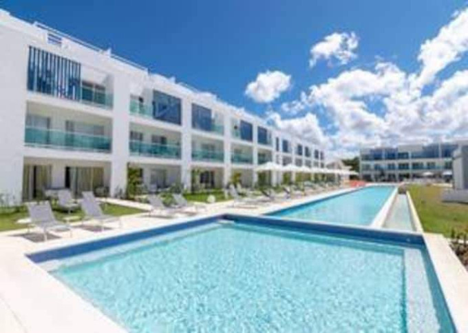 Condomínio com vista para a piscina e clube de praia em Cana Rock